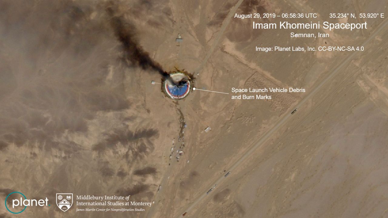 Satellite photos show burning Iran space center launch pad
