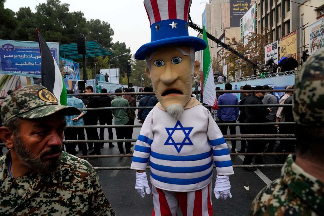 Iranians mark the anniversary of the 1979 US Embassy takeover while ...