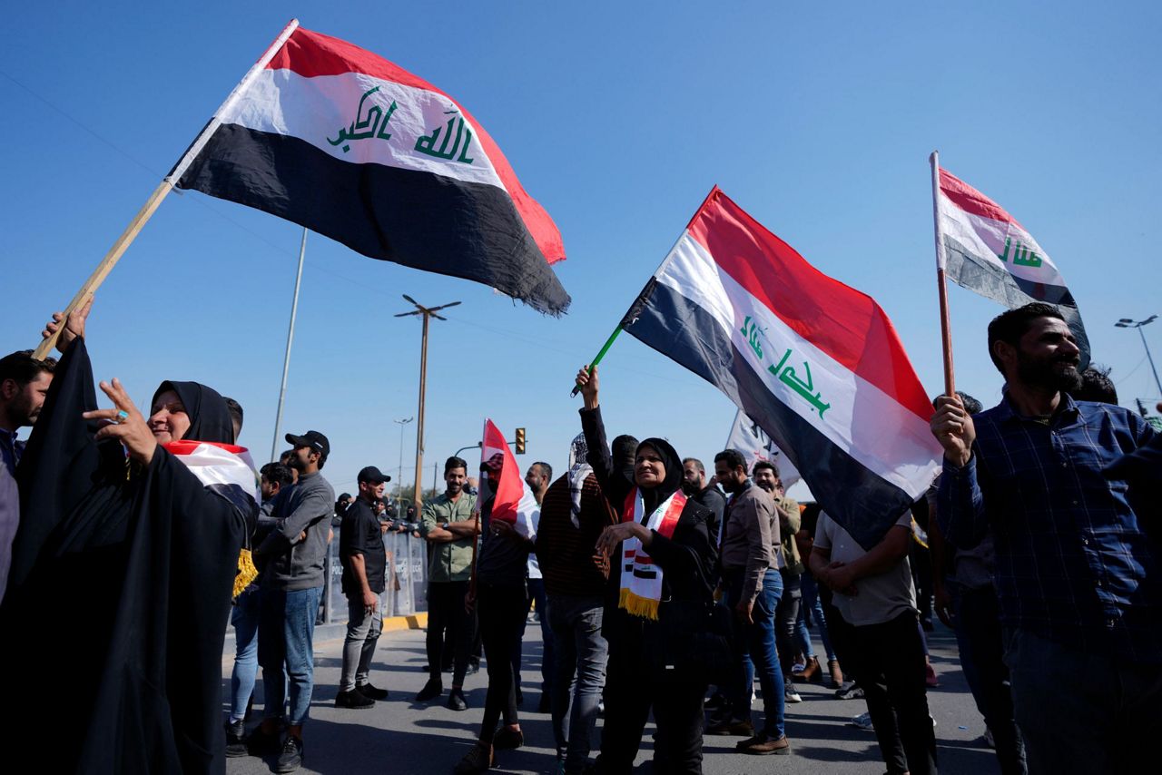 Hundreds protest new proposed election law in Baghdad
