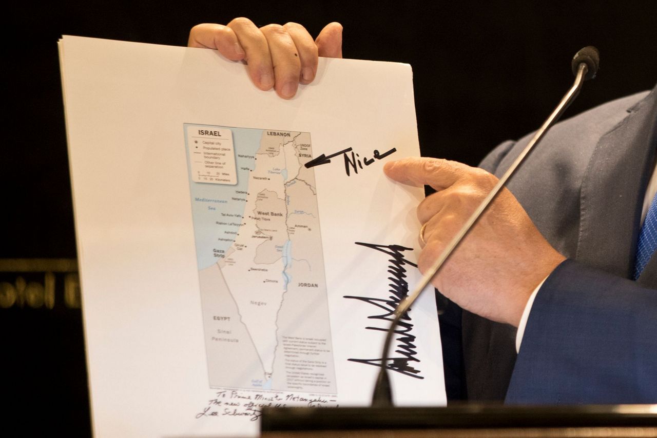 Netanyahu shows off Trump's map of Israel with Golan Heights