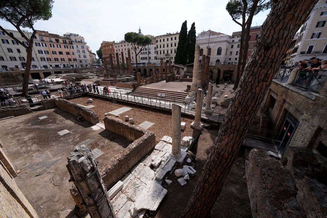 Ancient Rome temples complex, with ruins of building where Caesar was ...