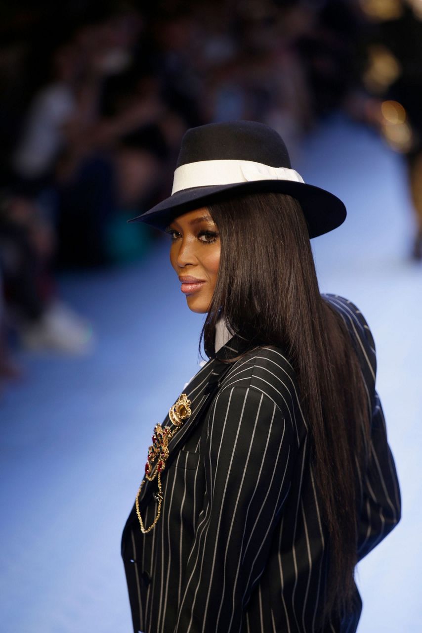 Model Naomi Campbell wears a creation as part of Dolce & Gabbana's...