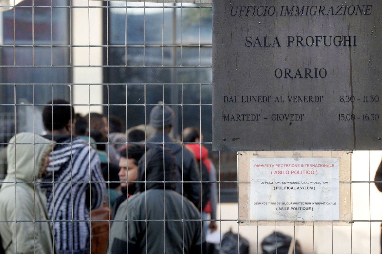 Italy's migrants fear new law deprives them of protections