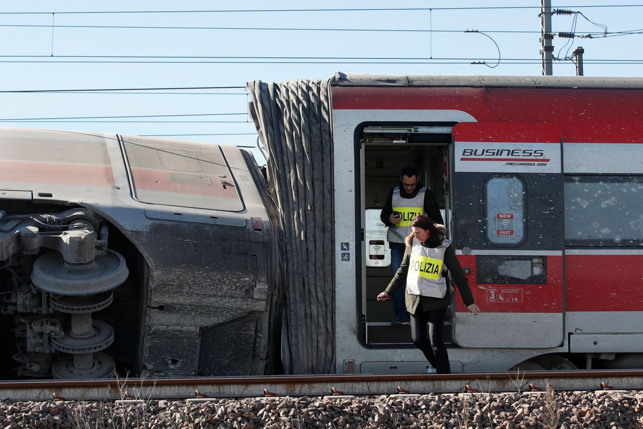Highspeed train derails in Italy; 2 railway workers killed