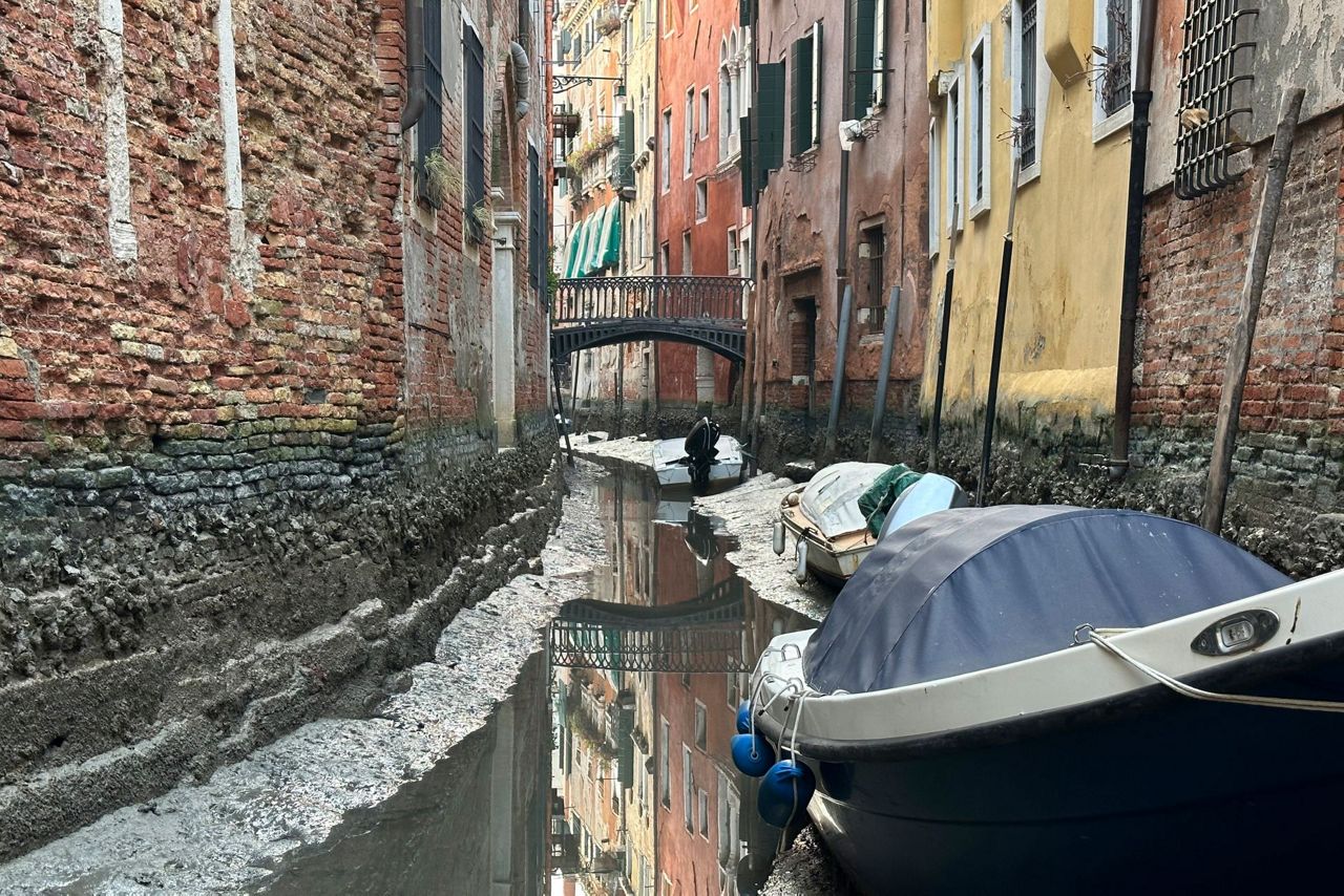 Prolonged low tides see smaller canals dry up in Venice