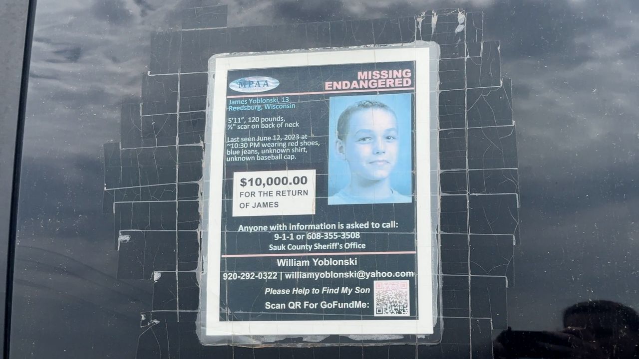 A poster is displayed on the side of James Yoblonski's father Bill's car. (Spectrum News 1/Natalie Sopyla)