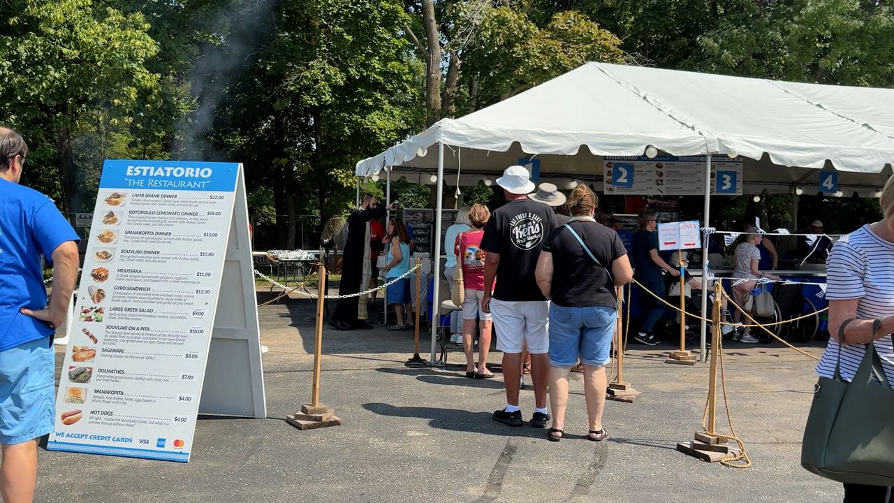 Attendees at the Greek Cultural Festival in Grand Rapids stand in line for food in this image from Aug. 15, 2025. (Spectrum News/Jack Caron)