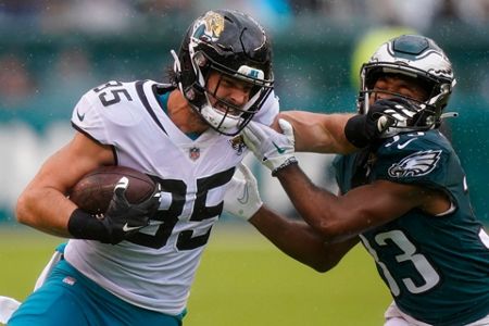 Jacksonville Jaguars' Jamal Agnew scores a touchdown in front of  Philadelphia Eagles' C.J. Gardner-Johnson during the first half of an NFL  football game Sunday, Oct. 2, 2022, in Philadelphia. (AP Photo/Matt Rourke