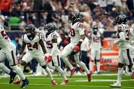 Taylor helps Texans down Lawrence, mistake-prone Jags 37-21