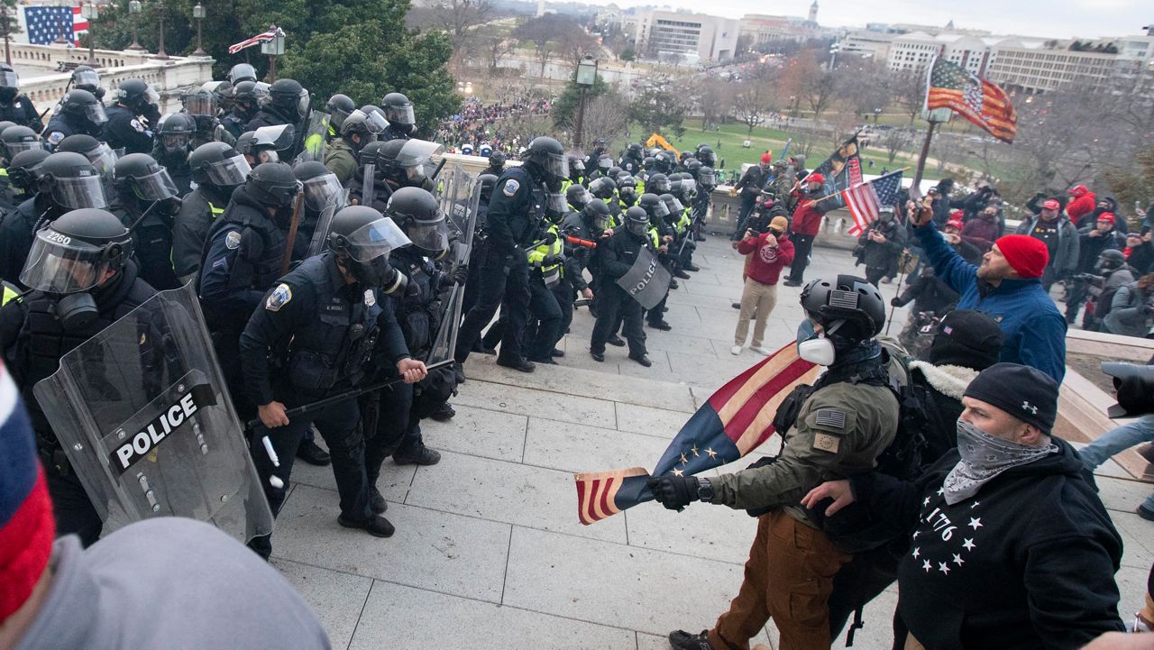 U.S. Capitol Police push back rioters who were trying to enter the U.S. Capitol on on Jan. 6, 2021, in Washington. (AP Photo/Jose Luis Magana, File)