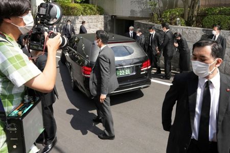 Abe's body arrives in Tokyo as country mourns ex-PM's death