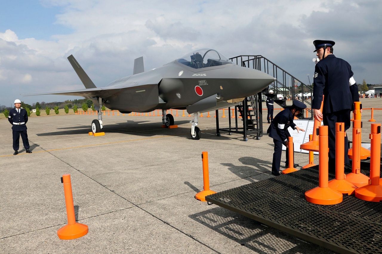 Japan would boost missile defenses in record military budget