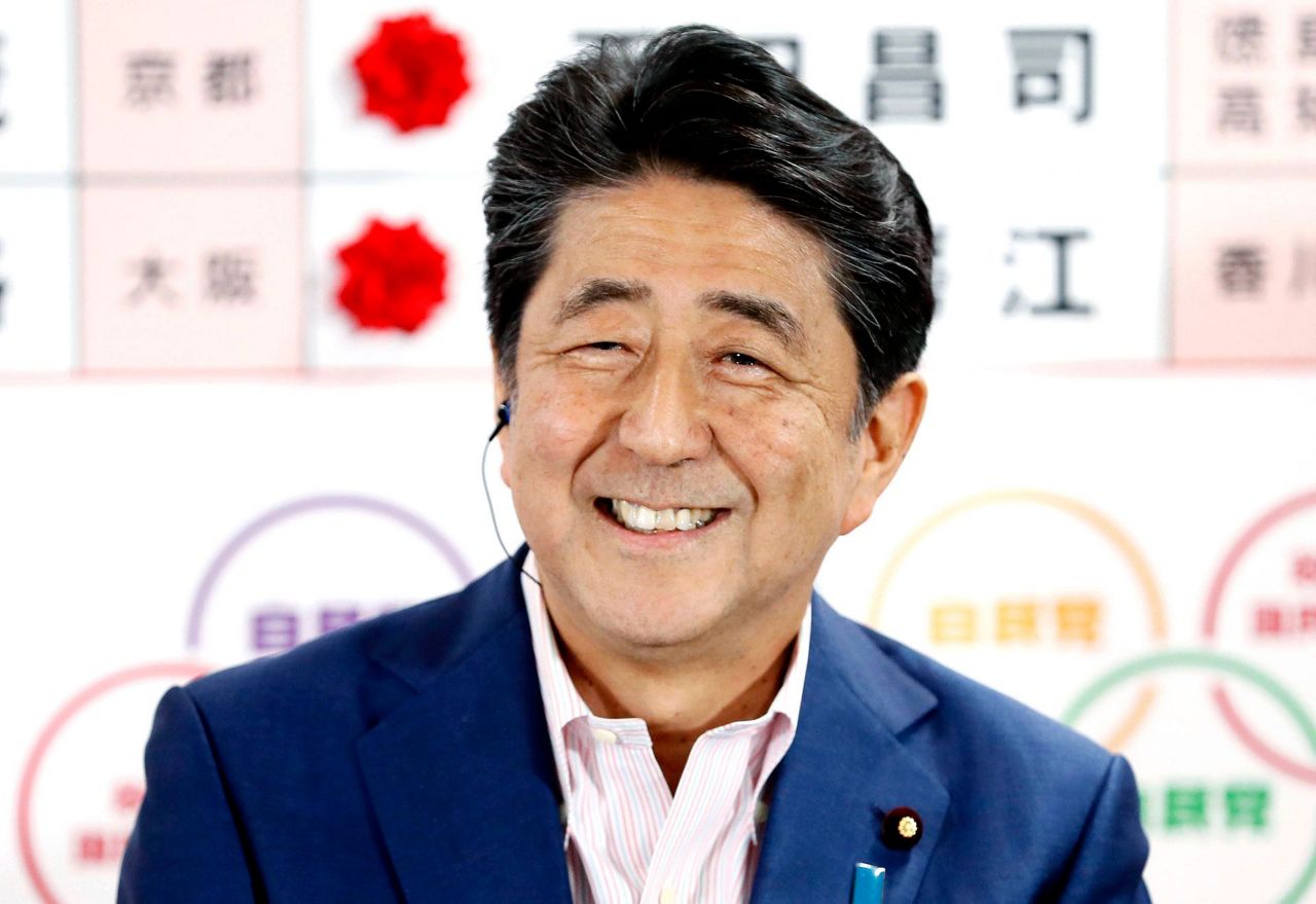 Japan votes for upper house; Abe's party seen as favorite