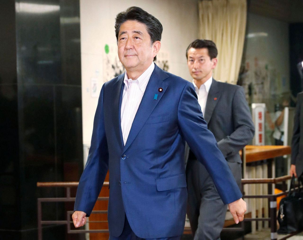 Japan votes for upper house; Abe's party seen as favorite