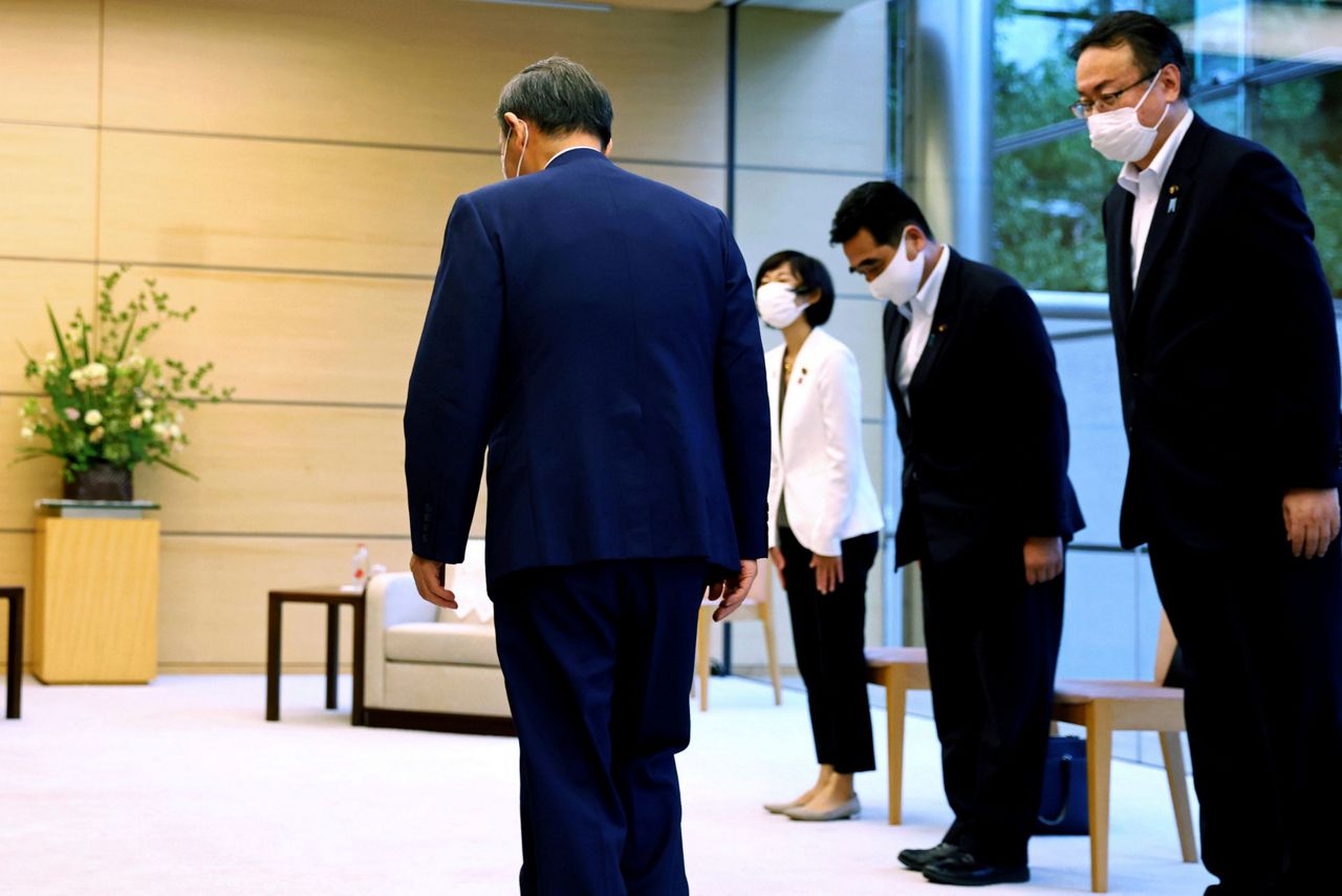 Japan PM to name new Cabinet, shifting some over church ties