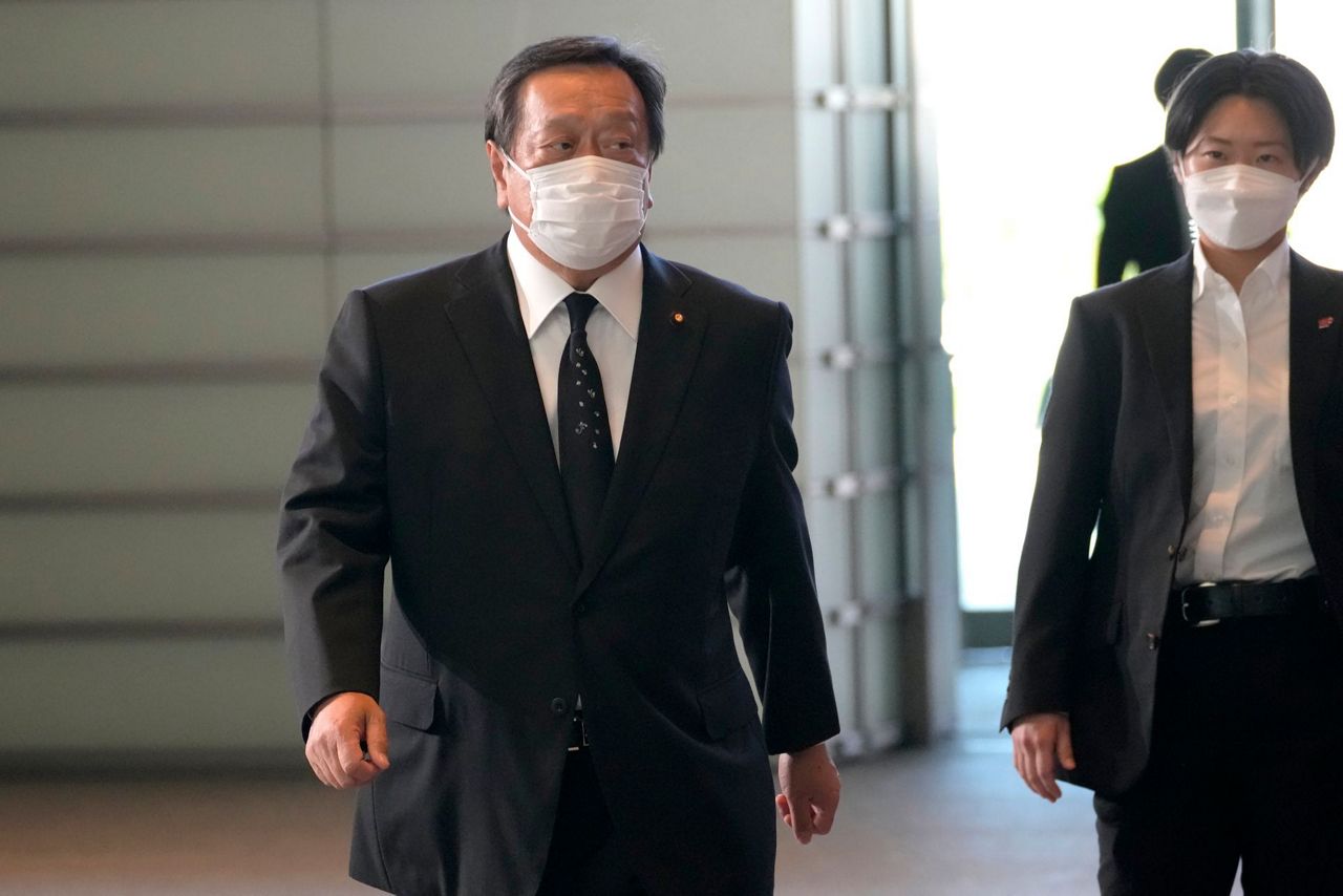 Japan PM to name new Cabinet, shifting some over church ties