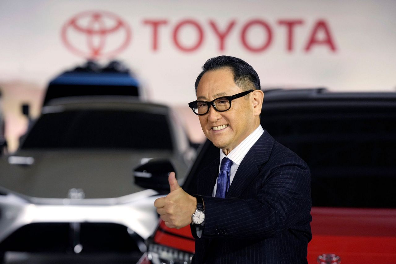 Japan's Toyota promises more electric models, investment