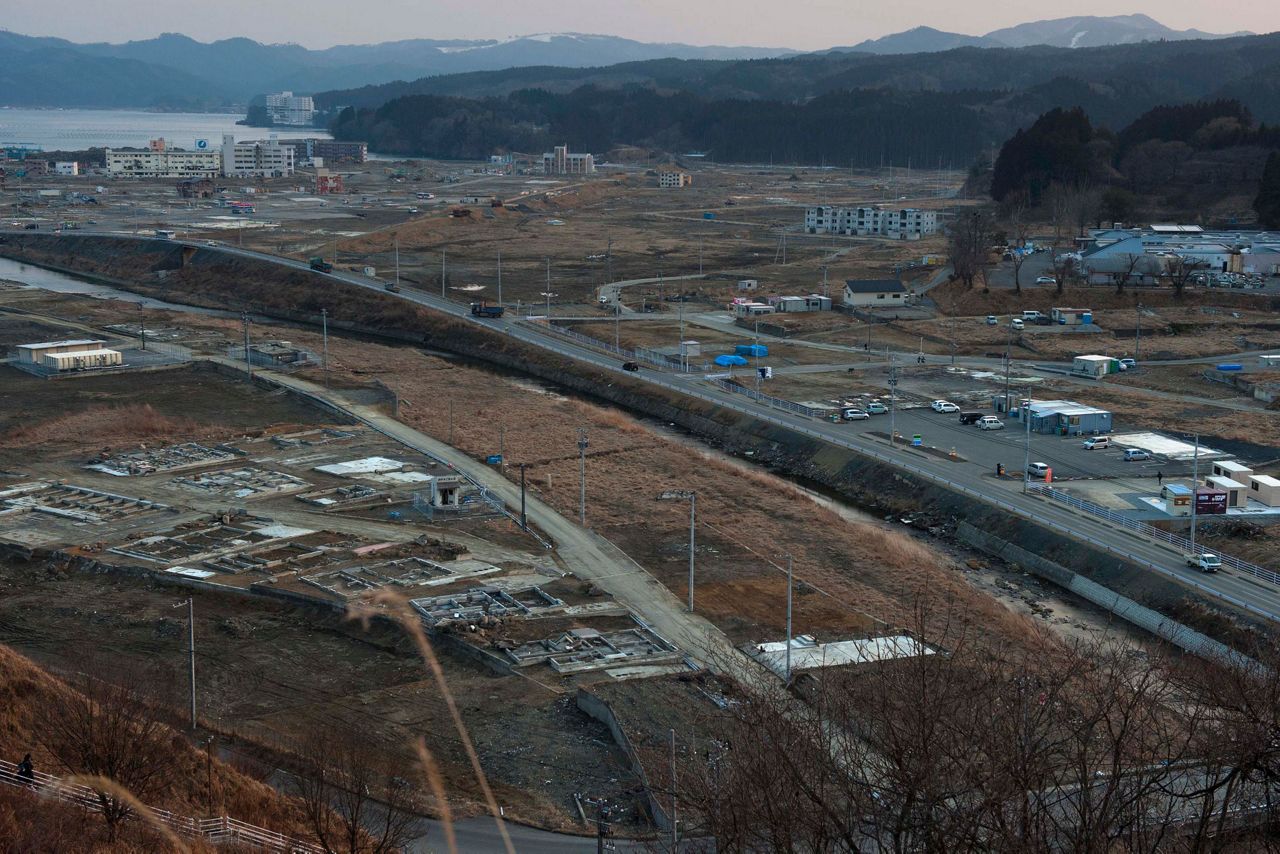 AP PHOTOS: Tsunami scars linger a decade later in Japan