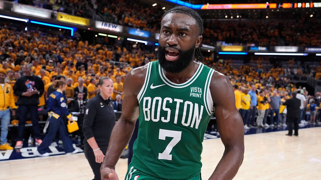 Boston Celtics guard Jaylen Brown (7) celebrates after Game 4 of the NBA Eastern Conference basketball finals against the Indiana Pacers, Monday, May 27, 2024, in Indianapolis. The Celtics won 105-102.(AP Photo/Michael Conroy)