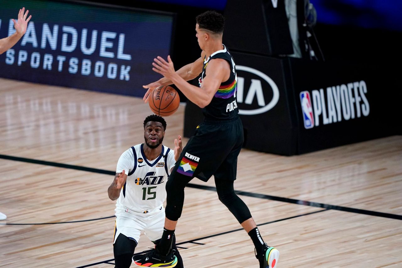 Donovan Mitchell scores 30 points, Jazz rout Nuggets 124-105