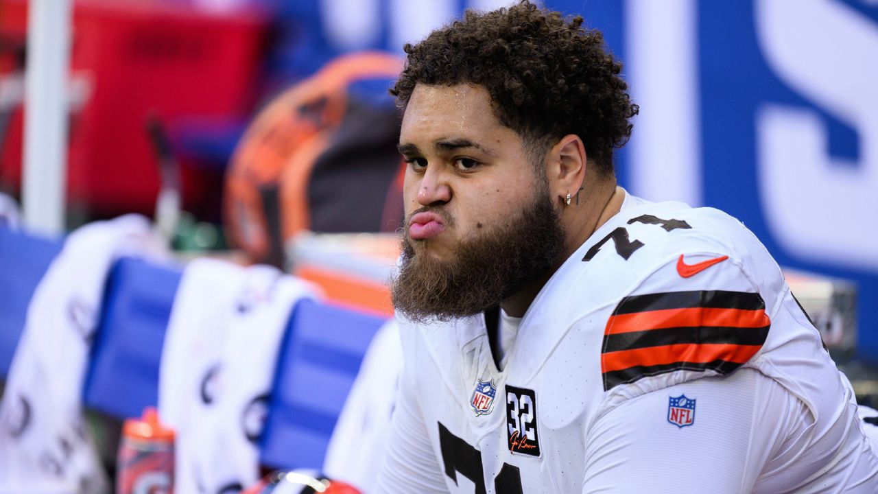 Cleveland Browns tackle Jedrick Wills Jr. (71)on the sidelines during an NFL football game against the Indianapolis Colts, Sunday, Oct. 22, 2023, in Indianapolis.