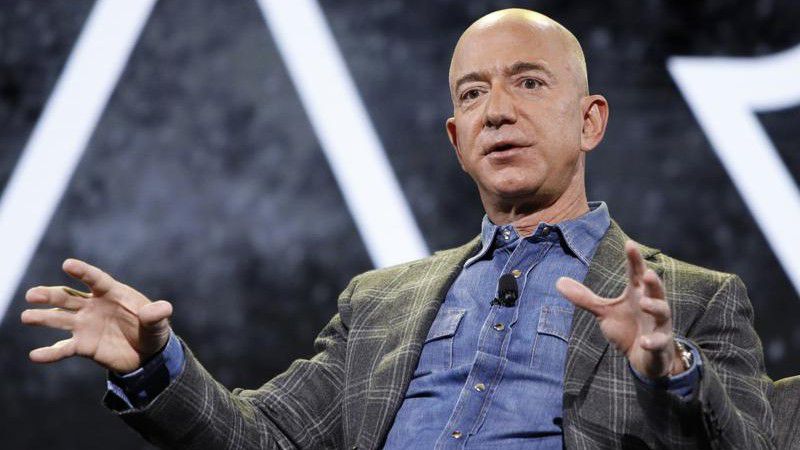 FILE - In this June 6, 2019 file photo, Amazon CEO Jeff Bezos speaks at the the Amazon re:MARS convention, in Las Vegas. Bezos, who grew Amazon from an internet bookstore to an online shopping behemoth, said Wednesday, May 26, 2021, that Amazon executive Andy Jassy will take over the CEO role on July 5. (AP Photo/John Locher)