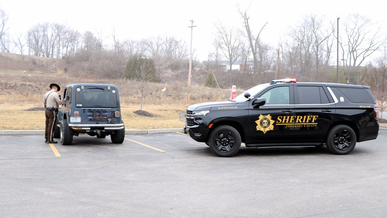 Jefferson County Sheriff deputy Zach Faulkner conducts a traffic stop Friday afternoon off Highway 30. The department and partnering agencies across the county were on special patrol citing expired license plates, temporary tags and more. (Spectrum News/Elizabeth Barmeier)