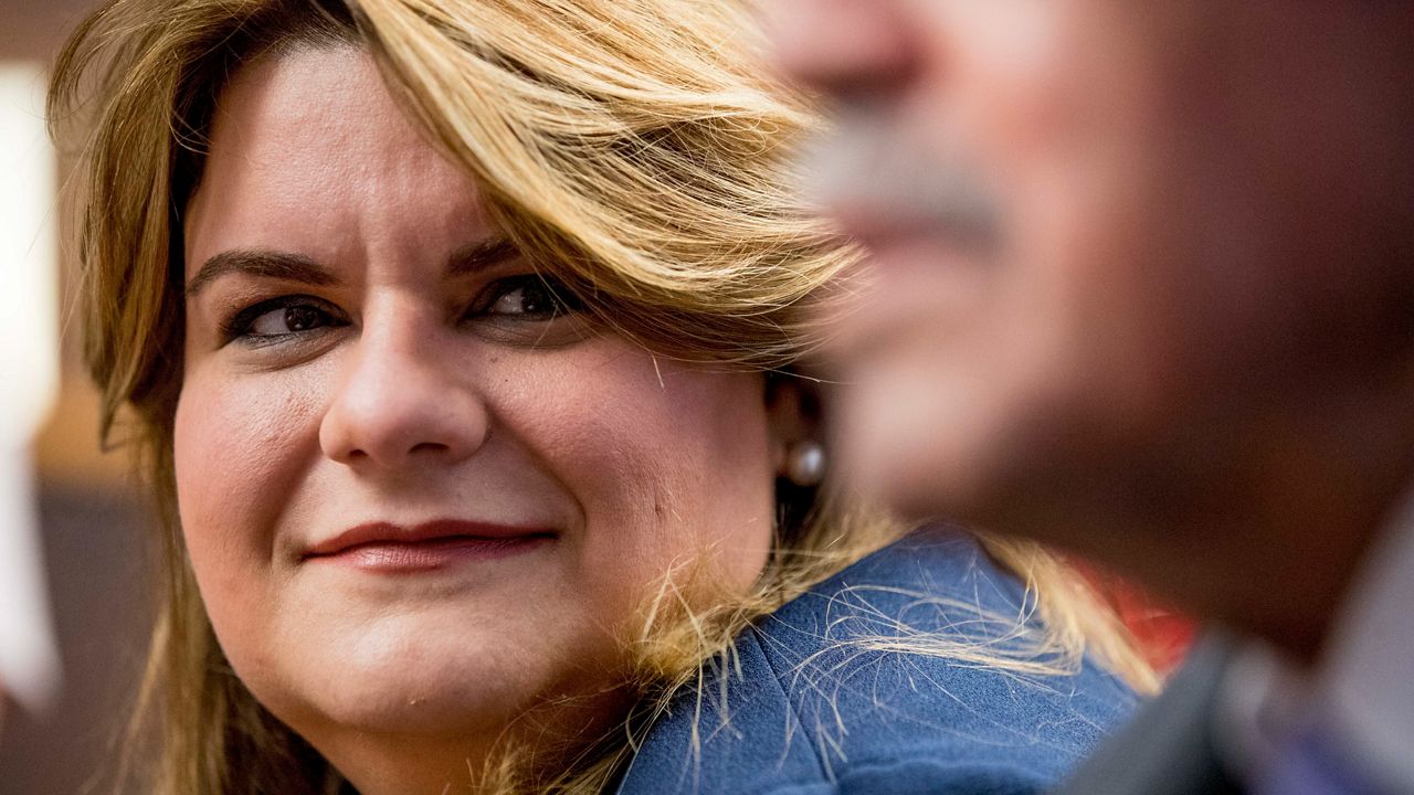 Resident Commissioner Jenniffer González, who represents Puerto Rico as a nonvoting member of Congress, smiles at a news conference about Puerto Rico statehood on Capitol Hill in Washington, Oct. 29, 2019. Puerto Rico congresswoman González beat Gov. Pedro Pierluisi in an upset during pro-statehood primary, June 2, 2024. (AP Photo/Andrew Harnik, File)