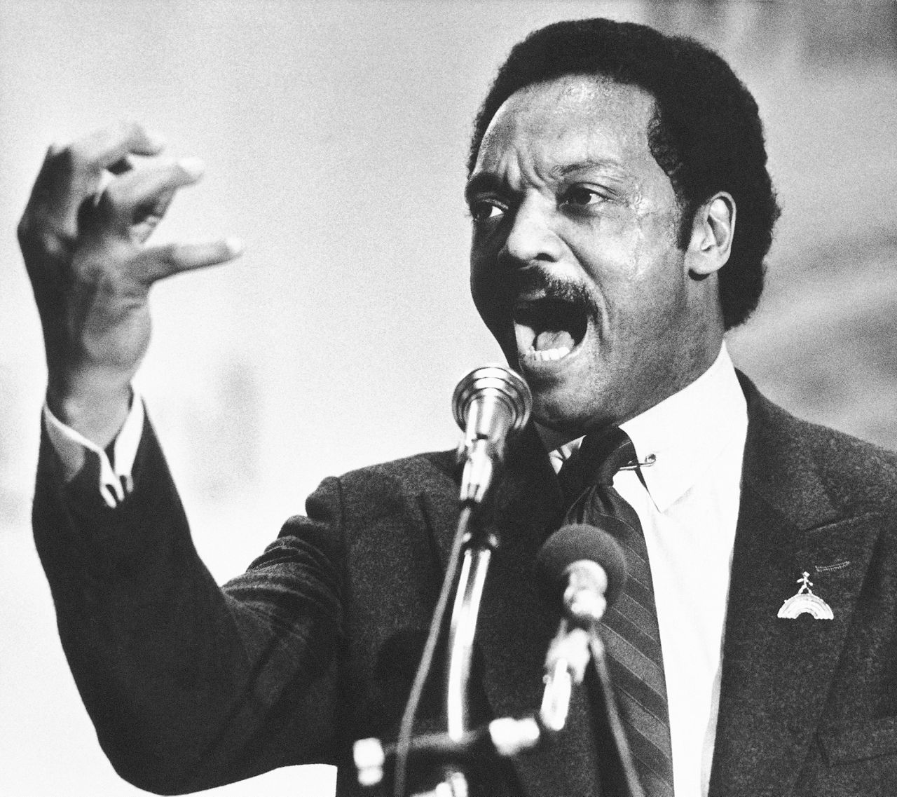 Democratic presidential primary candidate Jesse Jackson speaks to a group of his supporters at a rally held at a Baptist Church in Dayton, Ohio, April 14, 1984. (AP Photo/Rob Burns, File)