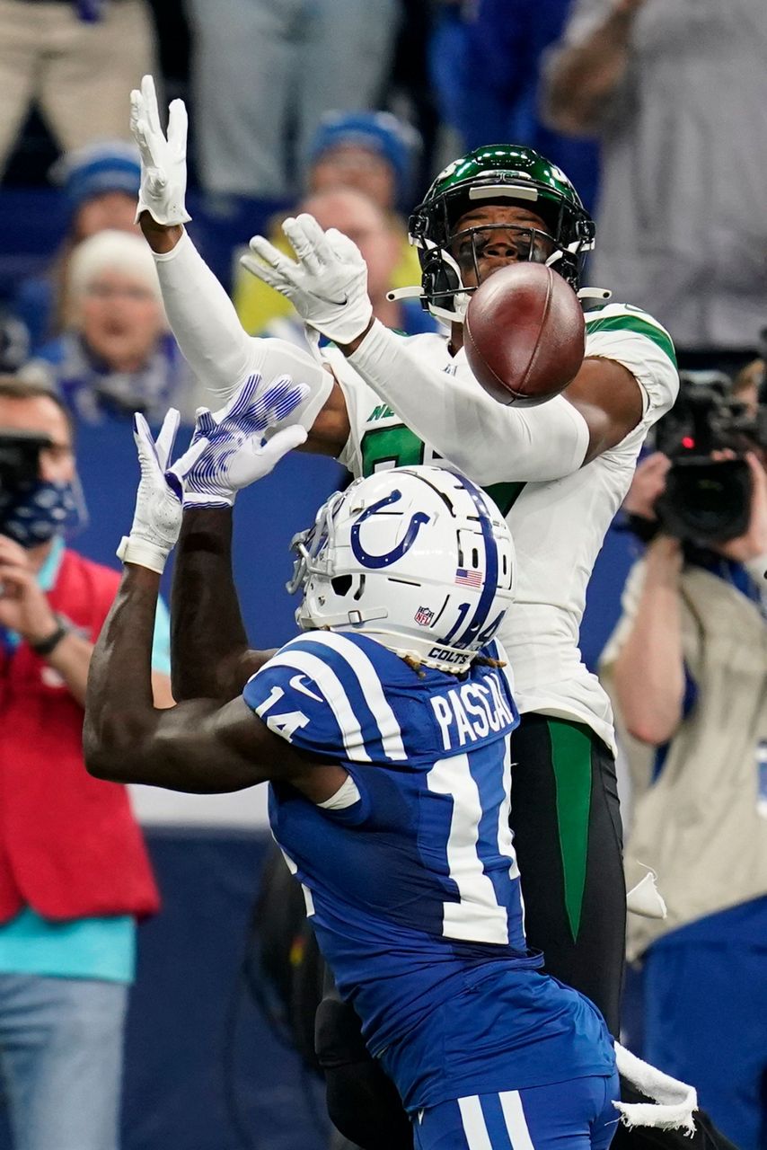 Taylor, ground game help Colts find easy path past Jets