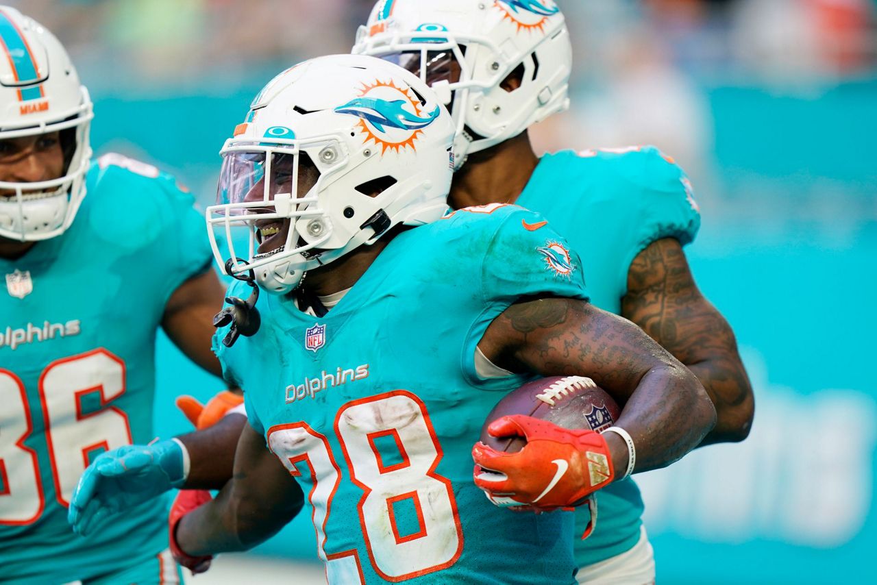 Miami Dolphins safety Jevon Holland (8) defends during an NFL