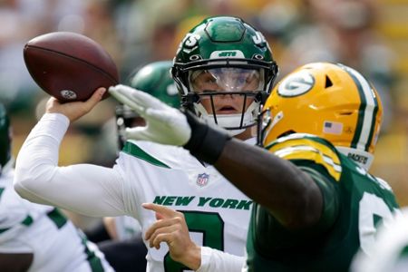 Wilson throws 2 TD passes as Jets beat Packers 23-14