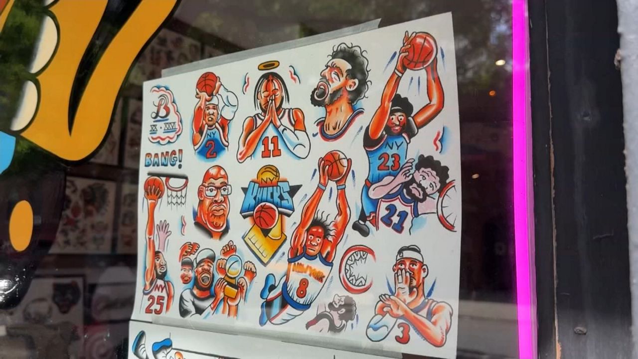 Knicks fans mark historic playoff run by getting team tattoos