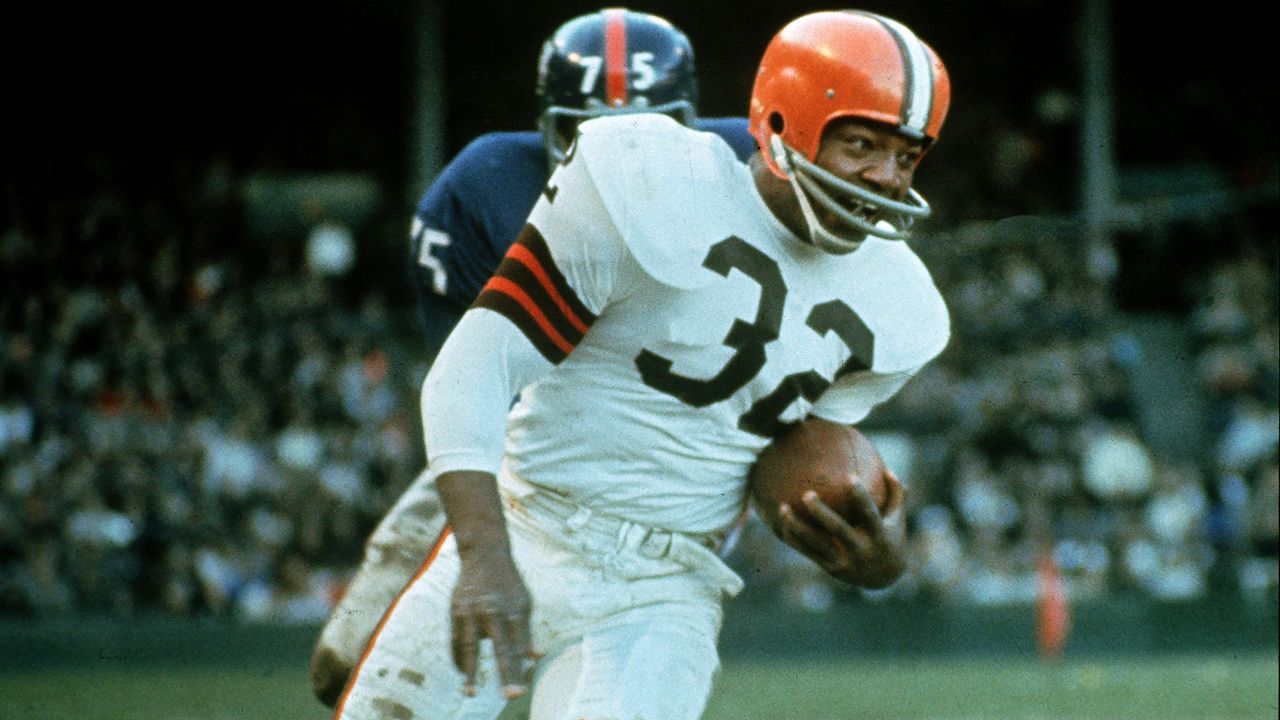 Green Bay Packers Ray Nitschke and Dave Robinson in action, tackle vs