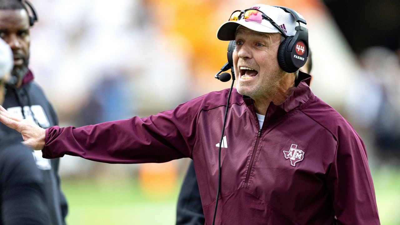 Texas A&M head coach Jimbo Fisher yells at his players during the second half of an NCAA college football game against Tennessee, Saturday, Oct. 14, 2023, in Knoxville, Tenn. (AP Photo/Wade Payne)