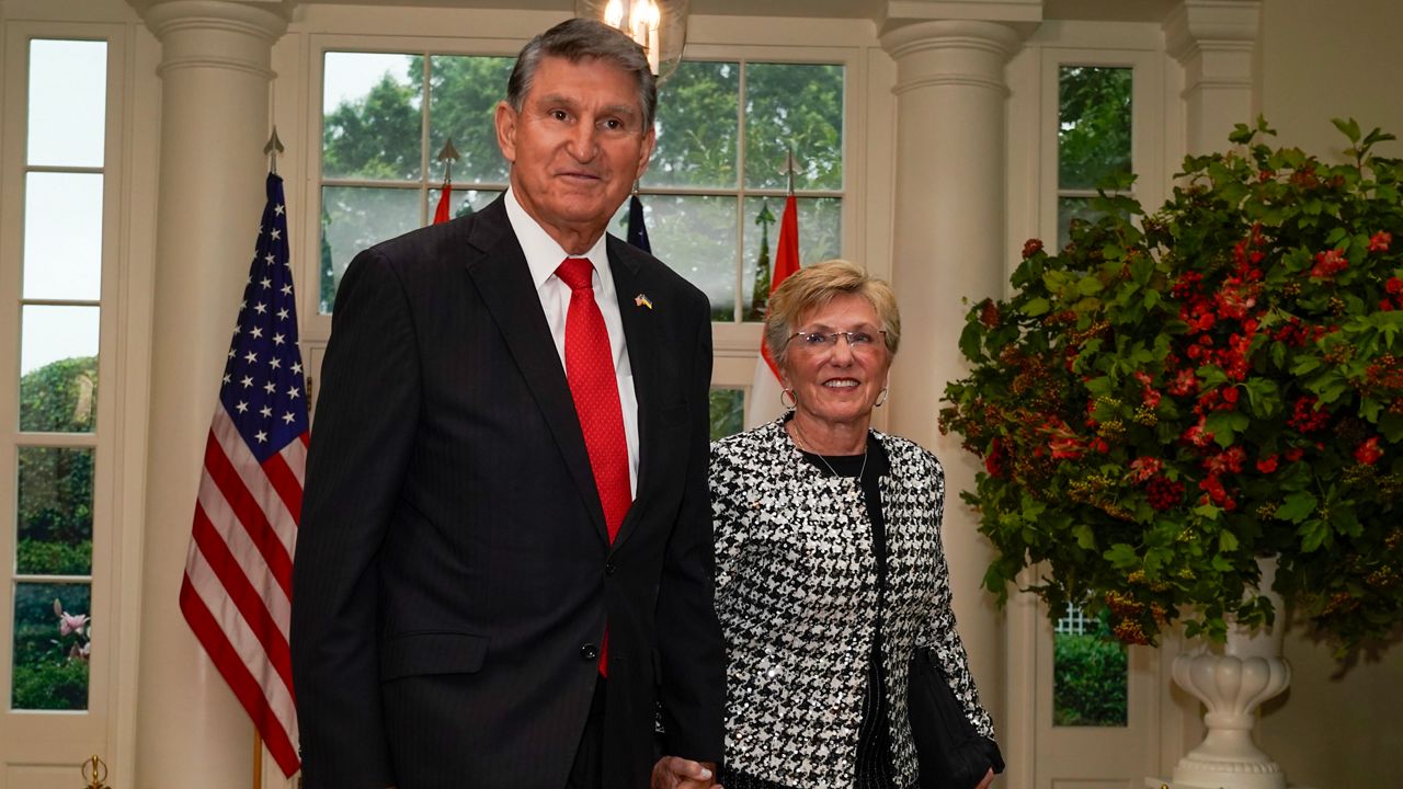 Sen. Joe Manchin, D-W.Va., and his wife, Gayle Manchin, arrive for the State Dinner with President Joe Biden and India's Prime Minister Narendra Modi at the White House, June 22, 2023, in Washington. Gayle Manchin and a colleague of hers, Guy Land, were injured Monday, Jan. 29, 2024, in the accident which happened in Birmingham as they traveled from the Birmingham-Shuttlesworth International Airport to an area hotel. (AP Photo/Jacquelyn Martin, File)