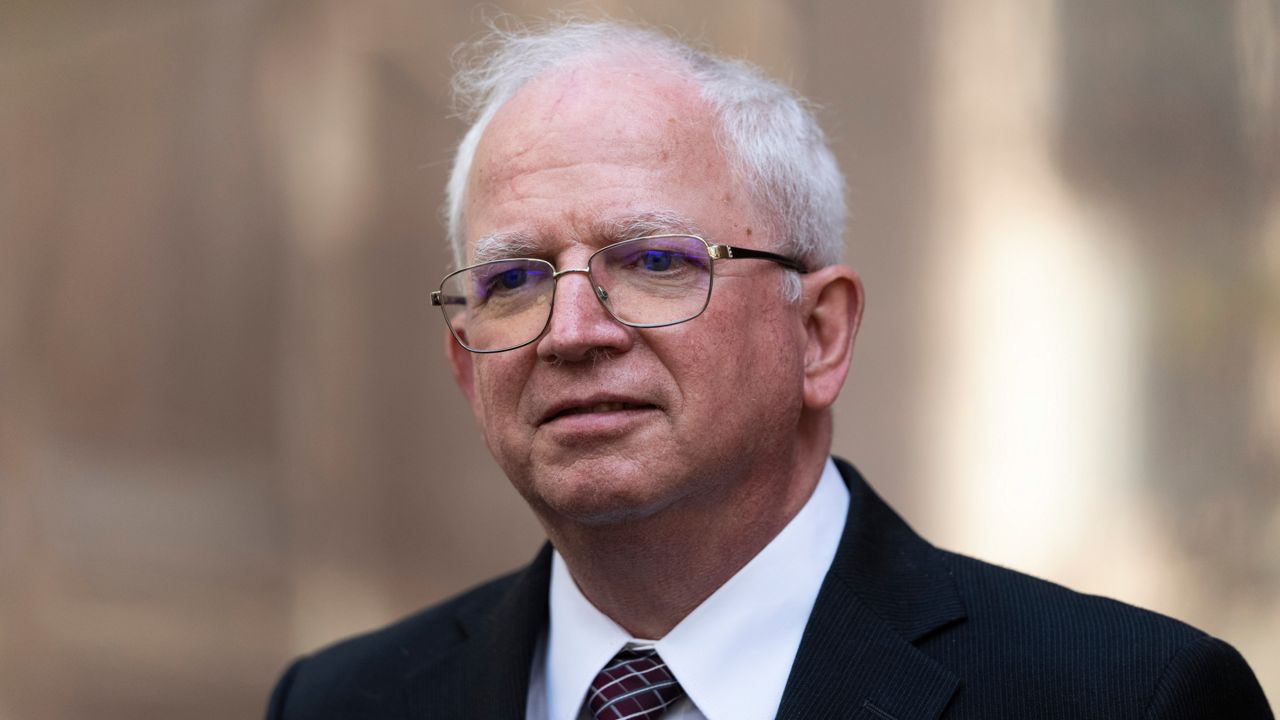 Attorney John Eastman, the architect of a legal strategy aimed at keeping former President Donald Trump in power, talks to reporters after a hearing in Los Angeles, June 20, 2023. (AP Photo/Jae C. Hong)