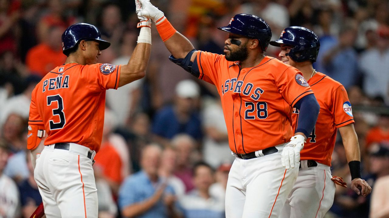 Singleton homers twice to lead Astros over Angels 11-3