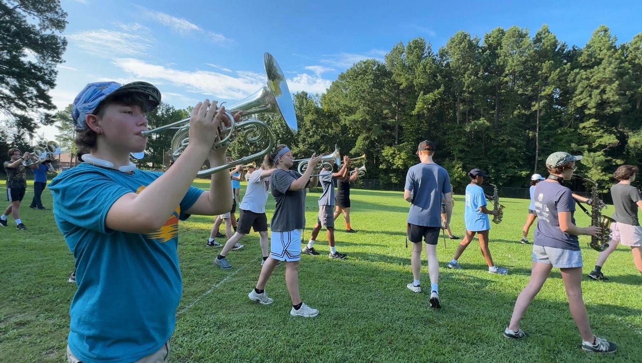 Teachers exercise caution as students conduct band camp during heat wave