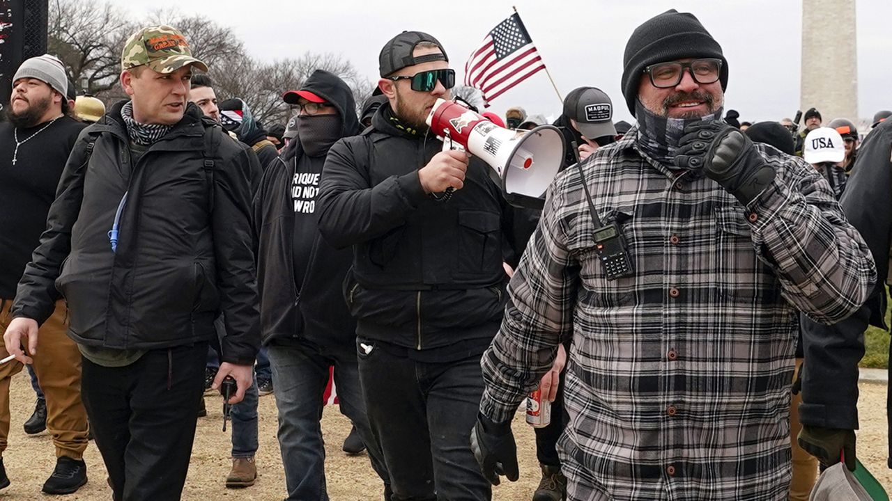 Proud Boys members including Zachary Rehl, left, Ethan Nordean, center, and Joseph Biggs, walk toward the U.S. Capitol in Washington, in support of President Donald Trump on Jan. 6, 2021. (AP Photo/Carolyn Kaster)