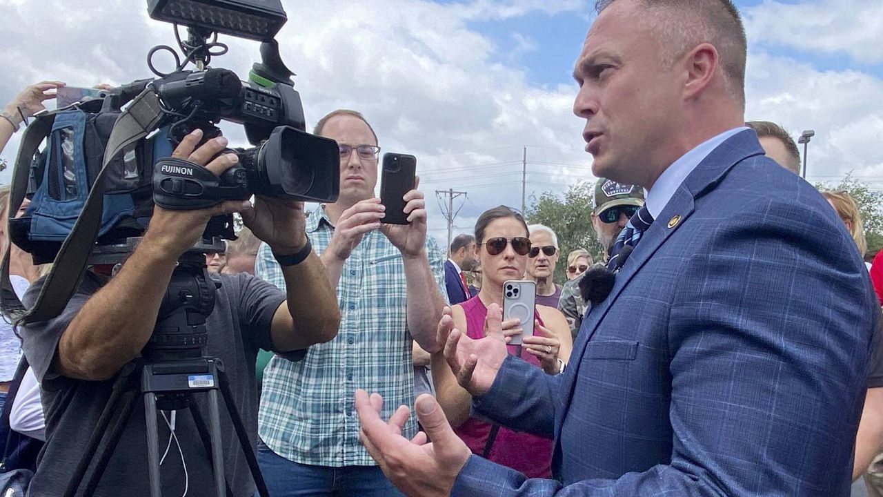 State Rep. Justin Sparks, R-Wildwood, fields questions from reporters during a press conference to address a transgender woman using the women's locker room at the Life Time fitness center in Ellisville, Mo., Friday, Aug. 2. (Ethan Colbert/St. Louis Post-Dispatch via AP)