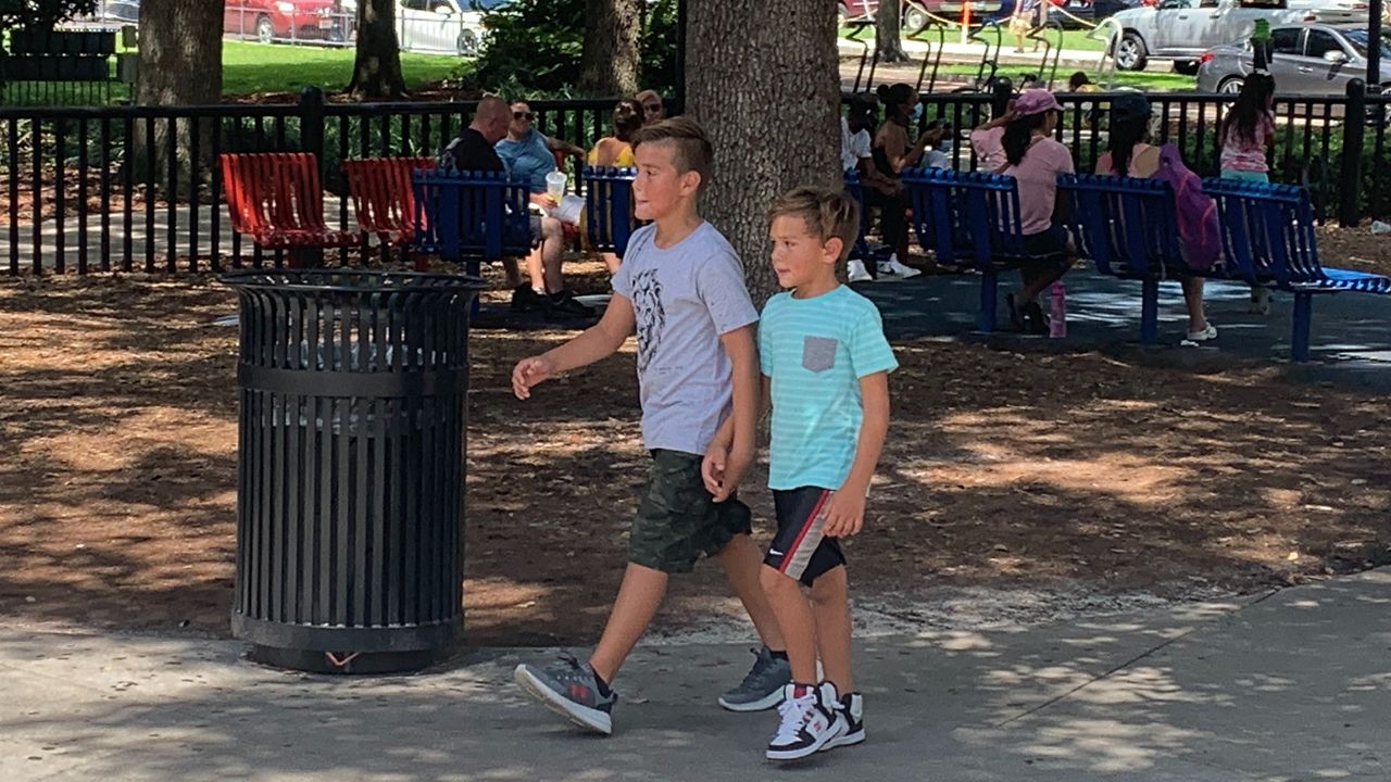 Two boys walking 