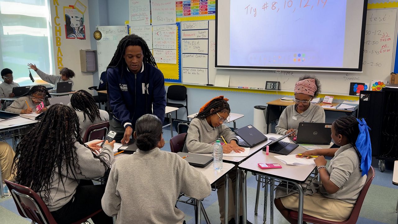KIPP Tech Valley Middle School is bringing fathers into the classroom.