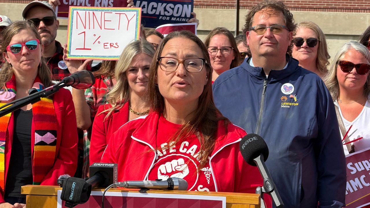 Katie Grinnell, a nurse who was recently fired for what she said was union activity, speaks at a rally outside Central Maine Medical Center on Friday. (Spectrum News/Susan Cover)