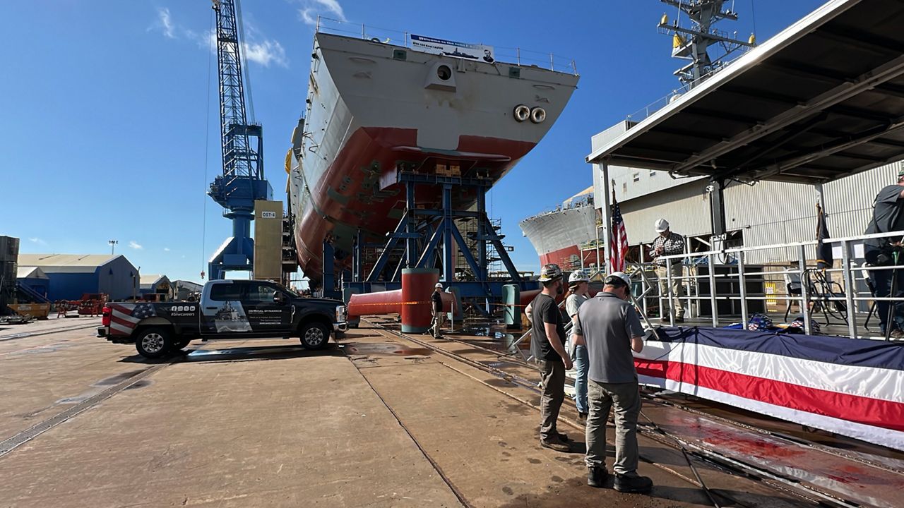 The lower hull and keel of an Arleigh Burke-class destroyer under construction at Bath Iron Works. The shipyard held a keel-laying ceremony for the vessel on Thursday. (Spectrum News/Sean Murphy)