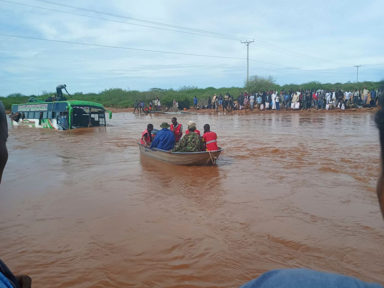 At least a dozen killed and an estimated 15,000 displaced by flooding ...