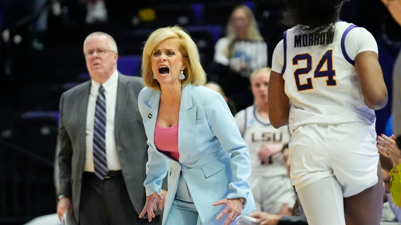 LSU head coach Kim Mulkey calls out from the bench during the first half of a first-round college basketball game against Rice in the women's NCAA Tournament in Baton Rouge, La., Friday, March 22, 2024. (AP Photo/Gerald Herbert)