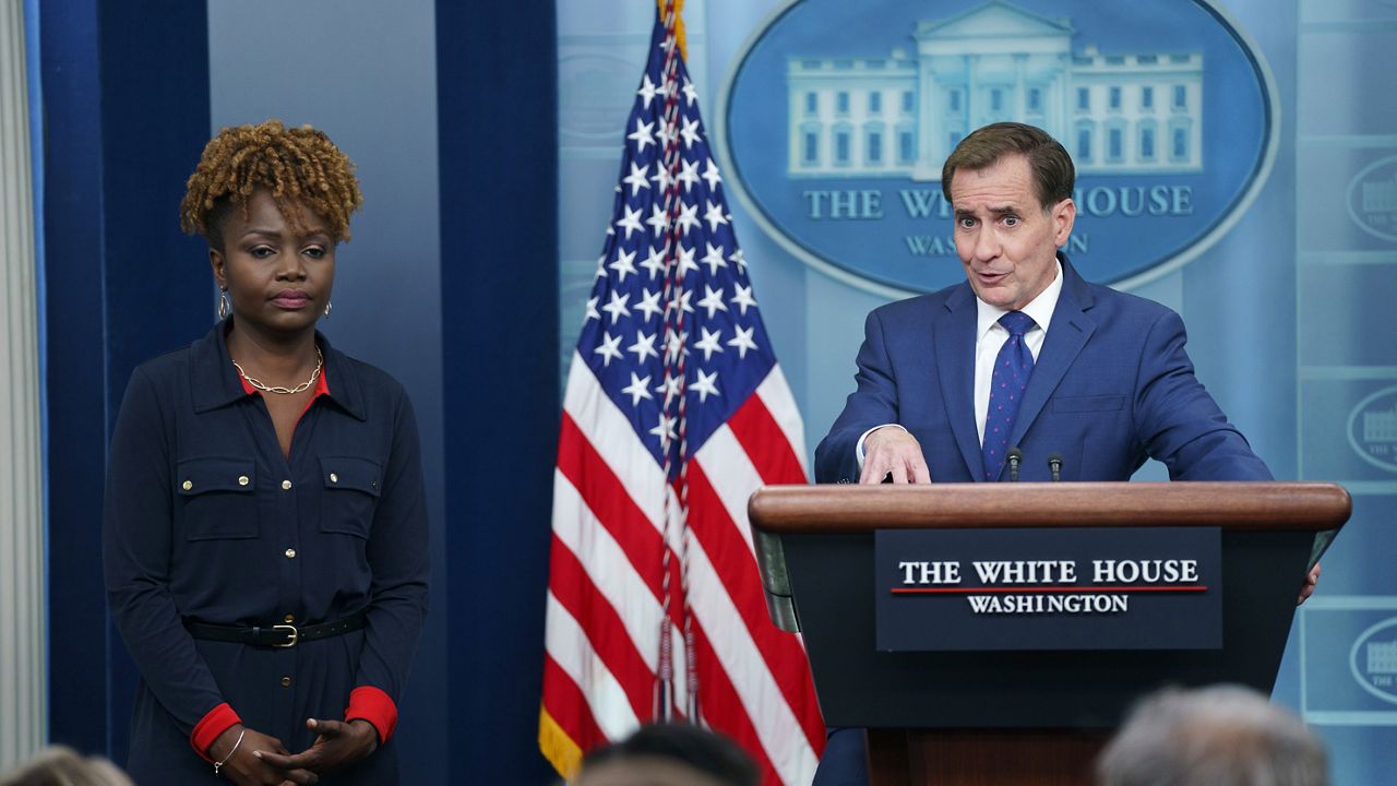 White House press secretary Karine Jean-Pierre listens as National Security Council spokesman John Kirby speaks during a briefing at the White House, Tuesday, May 16, 2023, in Washington. (AP Photo/Evan Vucci)