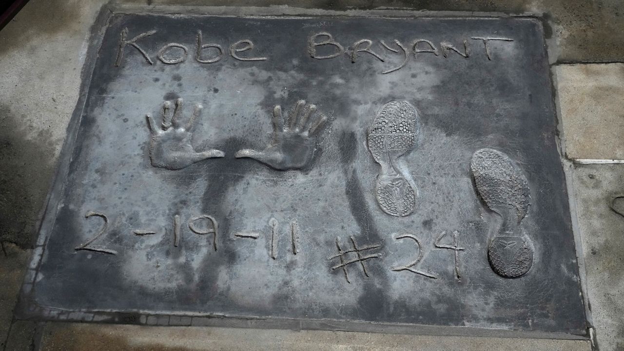 Hand and footprints belong to the late professional NBA player Kobe Bryant appear during a ceremony permanently placing them in the forecourt of the TCL Chinese Theatre on Wednesday, March 15, 2023, in Los Angeles. (Photo by Jordan Strauss/Invision/AP)