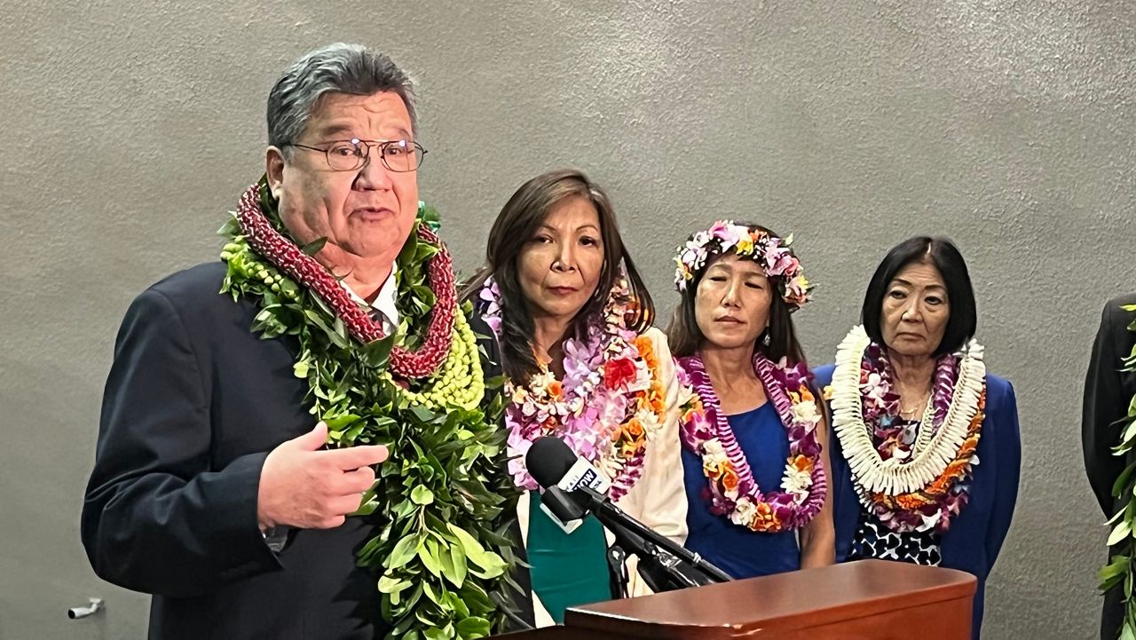 Senate president Ron Kouchi, Sens. Joy San Buenaventura, Maile Shimabukuro and Sharon Moriwaki and other Senate leaders met with news media following Wednesday's opening session.  (Spectrum News/Michael Tsai)